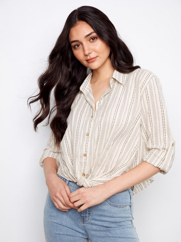 Featuring a front twist detail, this striped shirt adds a touch of flair to your wardrobe. Ideal for both work and play by Charlie B.
