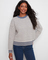 Relaxed fit striped sweater with ribbed knit, offering comfort and style by Charlie B.
