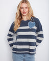 Heather denim striped sweater with long sleeves, showcasing heart patch embroidery on the chest by Charlie B.