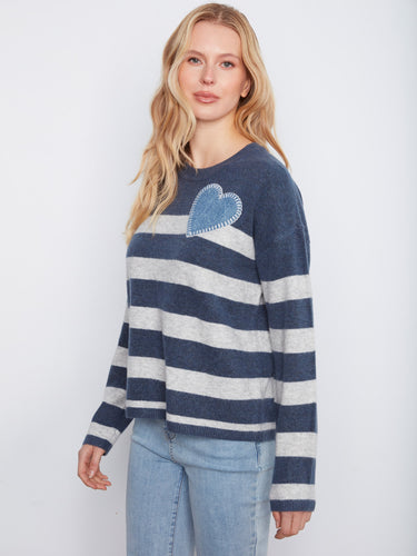 Heather denim striped sweater featuring a drop shoulder design and heart patch embellishment by Charlie B.
