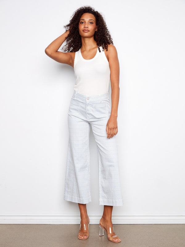 These cropped flare pants feature a flattering regular rise and stylish front patch pockets, perfect for any casual outing by Charlie B.
