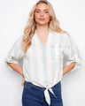 Light blue striped shirt featuring a collared V-neckline and button-down front, perfect for casual outings. By Charlie B.
