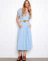 A stylish dress featuring a shirt collar and straw waist belt, perfect for casual outings. By Charlie B.