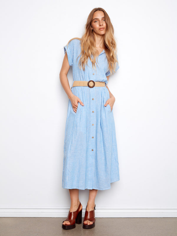 A stylish dress featuring a shirt collar and straw waist belt, perfect for casual outings. By Charlie B.