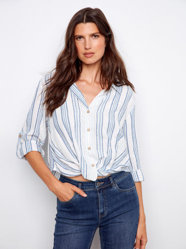 A front twist detail gives this top a modern and stylish look, perfect for elevating your everyday wardrobe. By Charlie B.
