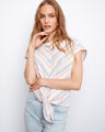 Striped top featuring a stylish boat neckline, perfect for casual outings. Designed with comfort in mind by Charlie B.