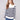 Offwhite striped sweater with a stylish mock neck design and elegant button details by Charlie B.
