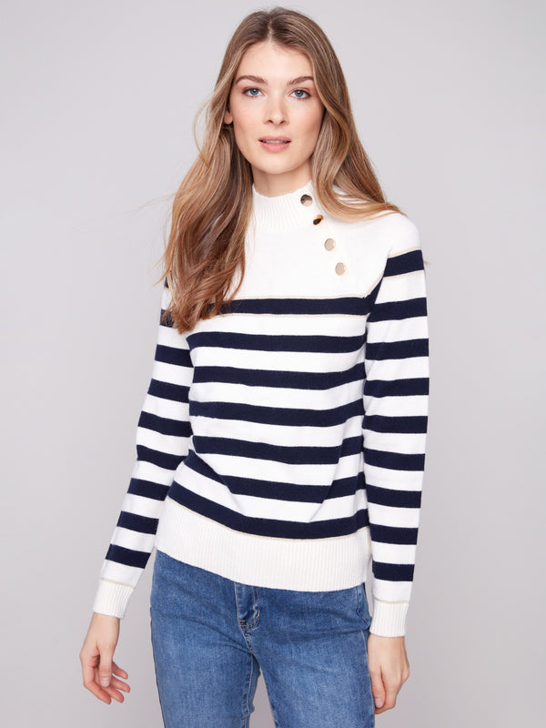 Offwhite striped sweater with a stylish mock neck design and elegant button details by Charlie B.