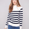 Offwhite striped sweater with a stylish mock neck design and elegant button details by Charlie B.