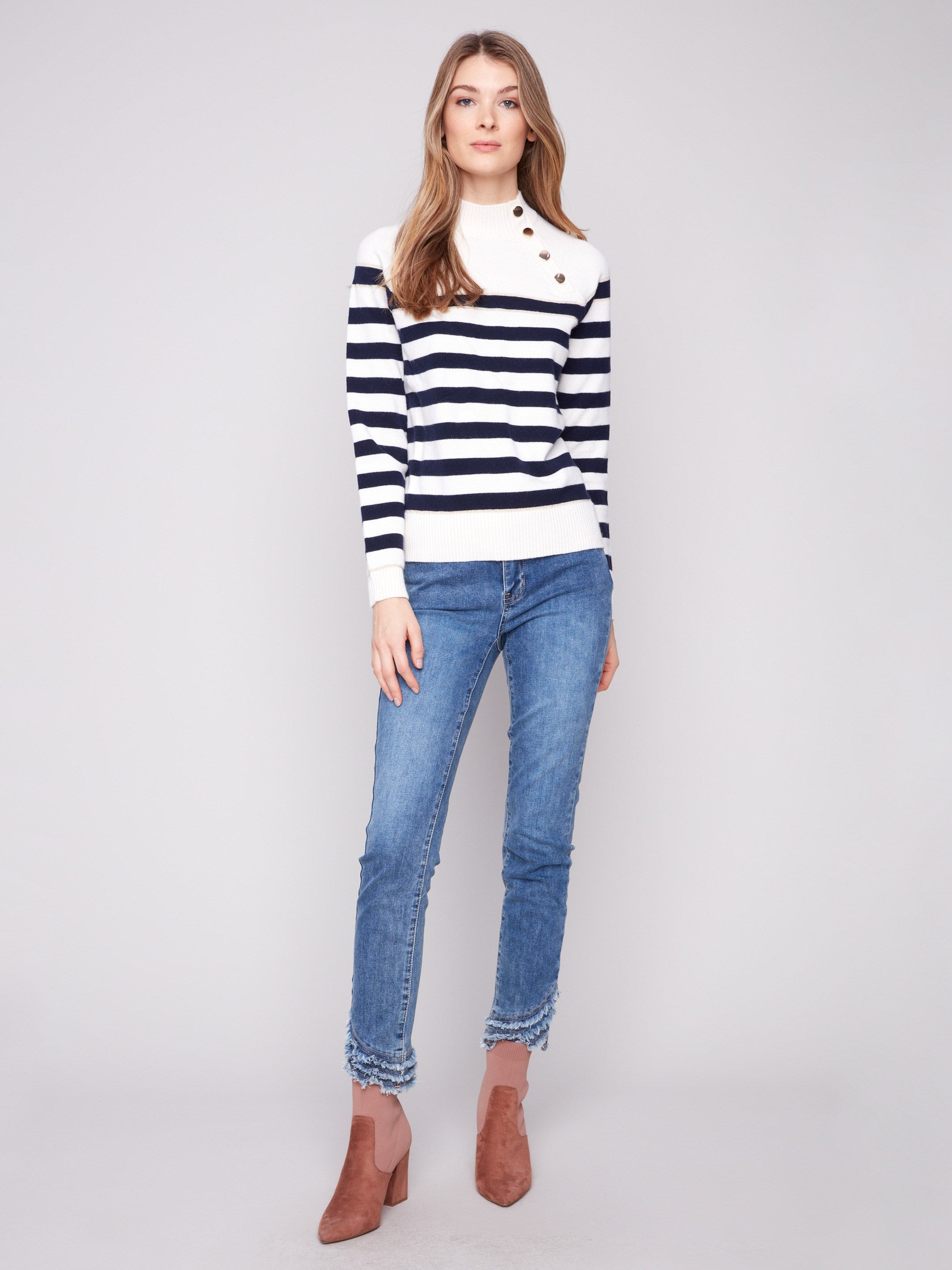 Chic offwhite sweater featuring raglan sleeves and classic stripes for a timeless look by Charlie B.