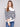 Striped sweater in offwhite with eye-catching button details at the neck for added flair by Charlie B.