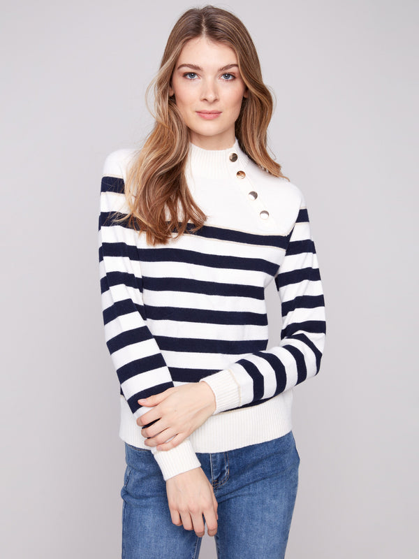 Striped sweater in offwhite with eye-catching button details at the neck for added flair by Charlie B.