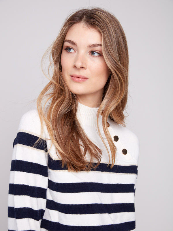Elegant offwhite striped sweater showcasing subtle gold detail for a touch of sophistication by Charlie B.