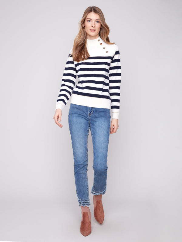 Stylish offwhite sweater with bold stripes and comfortable raglan sleeves, perfect for any occasion by Charlie B.