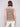 Casual and refined heather camel sweater vest with stripes, showcasing a modern aesthetic by Charlie B.