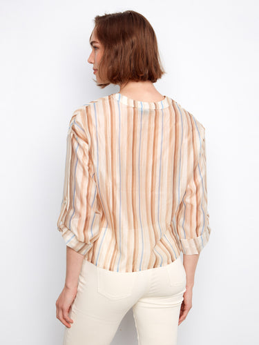 Showcasing the back view, this blouse maintains its elegant striped pattern throughout. By Charlie B.