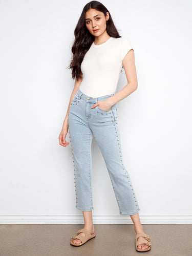 The five-pocket design enhances functionality while maintaining a stylish appearance in these jeans. By Charlie B.