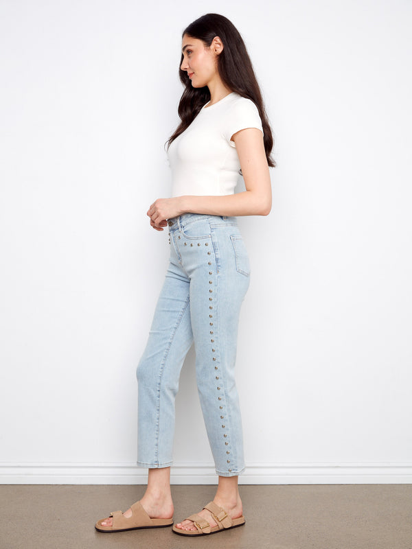 Adorned with stud details, these jeans add an edgy flair to your everyday wardrobe essentials. By Charlie B.