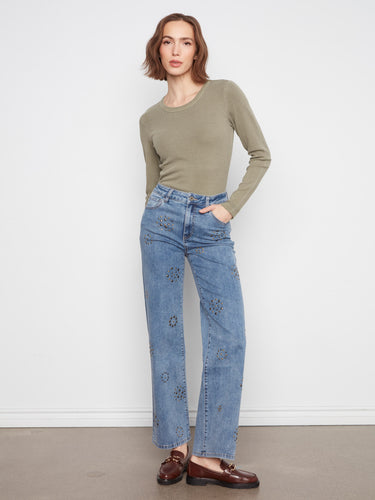 Jeans featuring a stylish wide leg design, perfect for a modern look. Crafted with attention to detail by Charlie B.