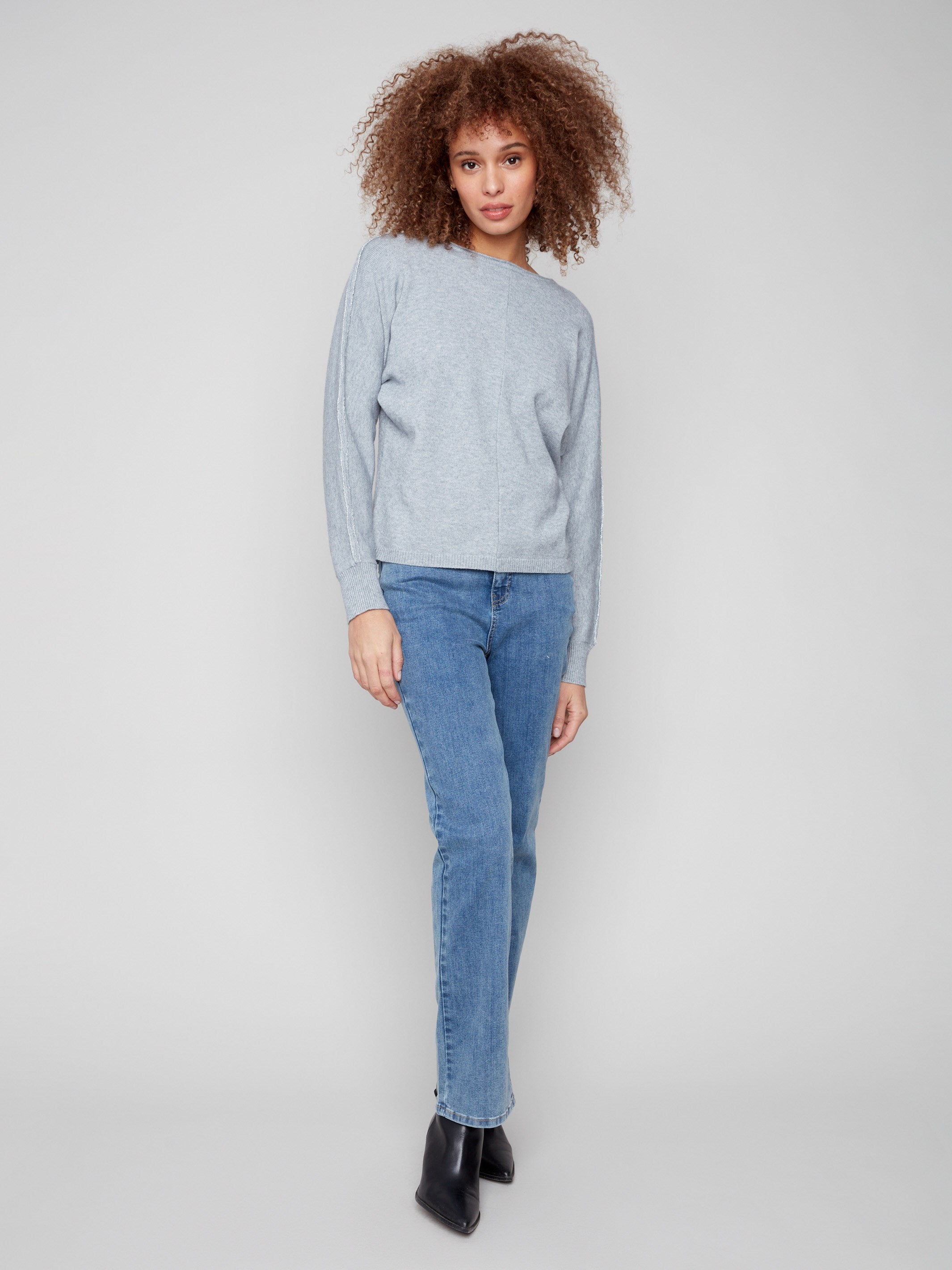 Stylish heather grey sweater showcasing a boat neck and exquisite ribbed cuffs by Charlie B.
