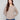 Heather taupe sweater featuring dolman sleeves and ribbed cuffs, perfect for a cozy yet stylish look by Charlie B.
