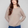 Heather taupe sweater featuring dolman sleeves and ribbed cuffs, perfect for a cozy yet stylish look by Charlie B.