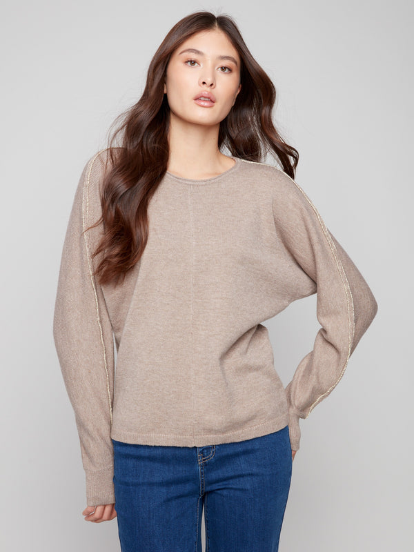 Stylish heather taupe sweater with front seam detail, combining simplicity and elegance effortlessly by Charlie B.