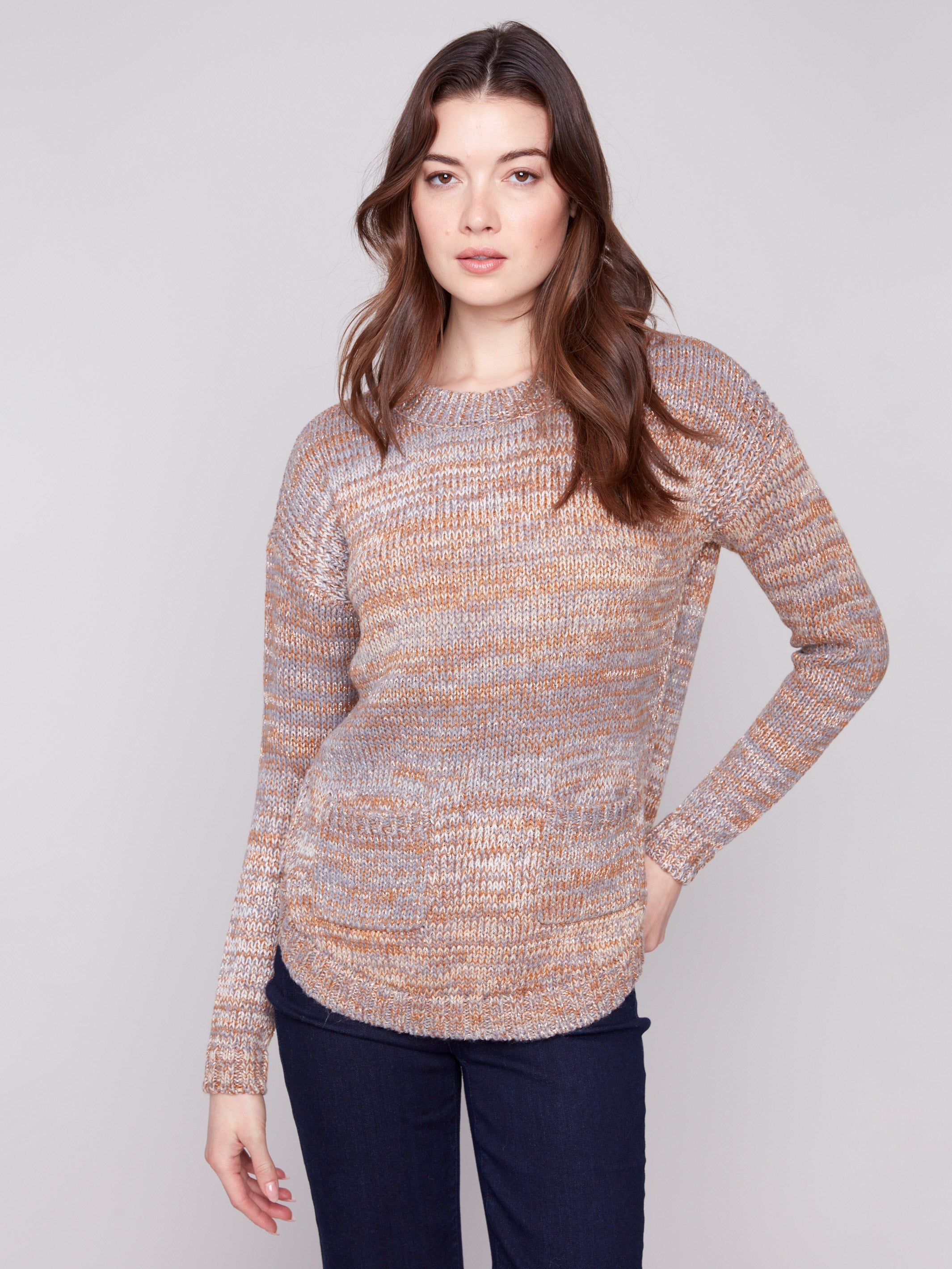 Fog-colored sweater with a crew neckline, featuring subtle metallic detail and front pockets by Charlie B.