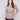 Fog-colored sweater with a crew neckline, featuring subtle metallic detail and front pockets by Charlie B.