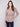 Fog-colored sweater with a crew neckline, featuring subtle metallic detail and front pockets by Charlie B.