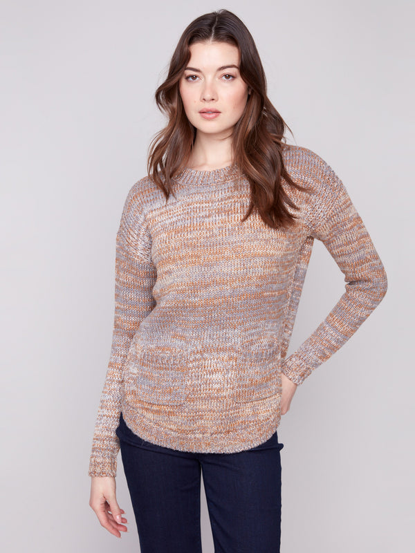 Fog-colored sweater with a crew neckline, featuring subtle metallic detail and front pockets by Charlie B.