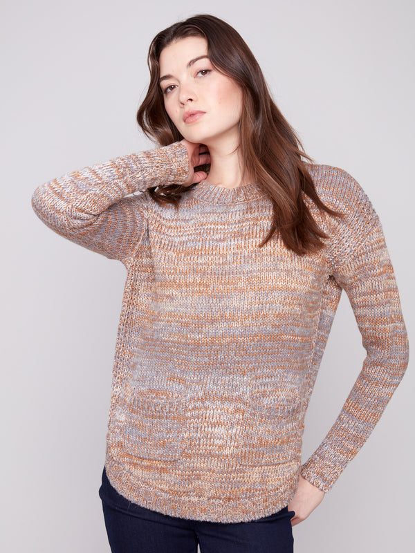 Sweater in fog color, emphasizing the crew neckline and soft knit fabric for a stylish look by Charlie B.