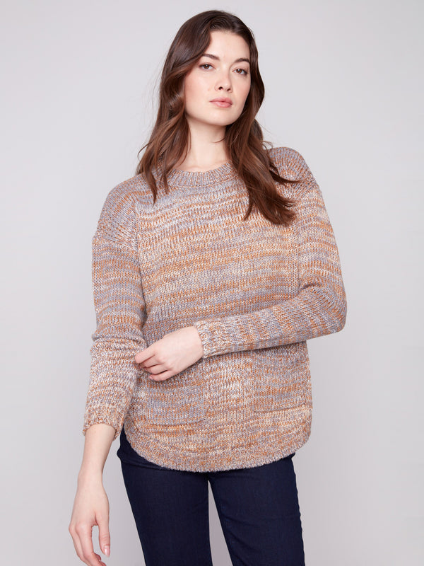 Fog-toned sweater featuring round hemline with elegant subtle metallic accents for added flair by Charlie B.