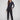Black slim-leg techno pants featuring a relaxed fit and pull-on style with drawstring by Charlie B.