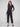 Black slim-leg techno pants featuring a relaxed fit and pull-on style with drawstring by Charlie B.