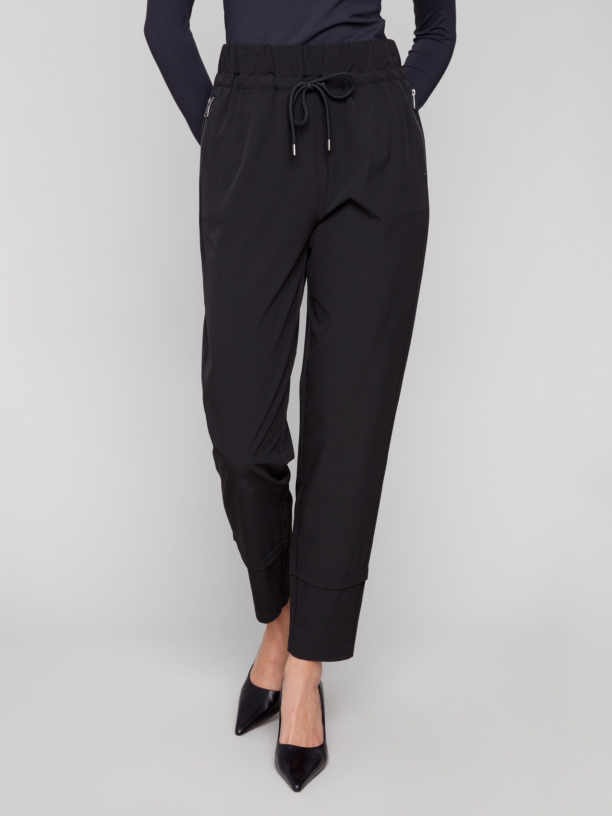 Techno pants in black, showcasing cuff detail and a comfortable elastic waistband by Charlie B.