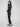 Slim-leg black techno pants with a stylish pull-on design and adjustable drawstring waist by Charlie B.