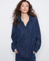 Indigo Tencel shirt with a relaxed fit and button-front closure, featuring a chest patch pocket. By Charlie B.