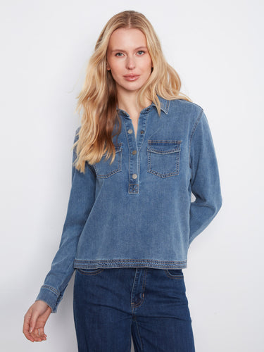 Stylish denim shirt featuring a classic shirt collar and crafted from stretch Tencel for comfort. Perfect for any casual outing. By Charlie B.