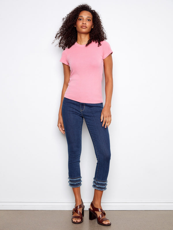 Casual pink shirt featuring a ribbed texture and comfortable crew neck, offering a flattering semi-fitted silhouette by Charlie B.