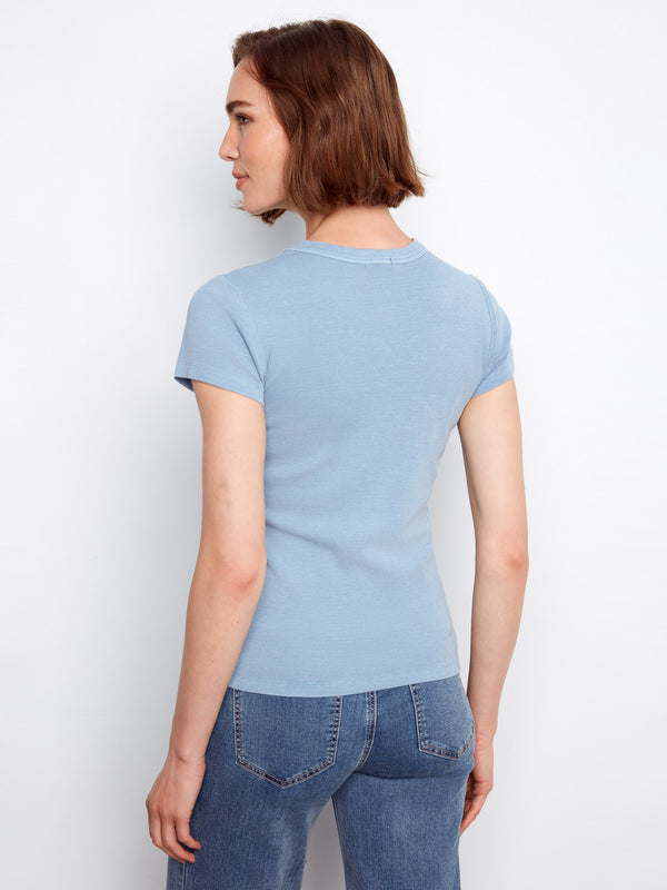 Chic semi-fitted blue tee that highlights your natural shape while ensuring all-day ease of movement and style. By Charlie B.