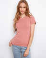 Ribbed texture enhances the carnation T-shirt's elegance, perfect for versatile styling by Charlie B.