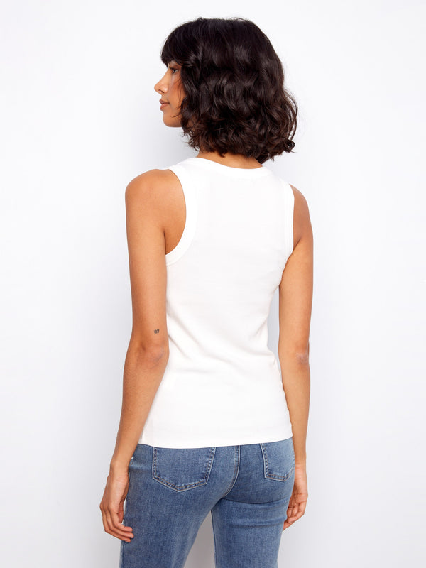 Casual white ribbed tank offering versatile style and comfort by Charlie B.