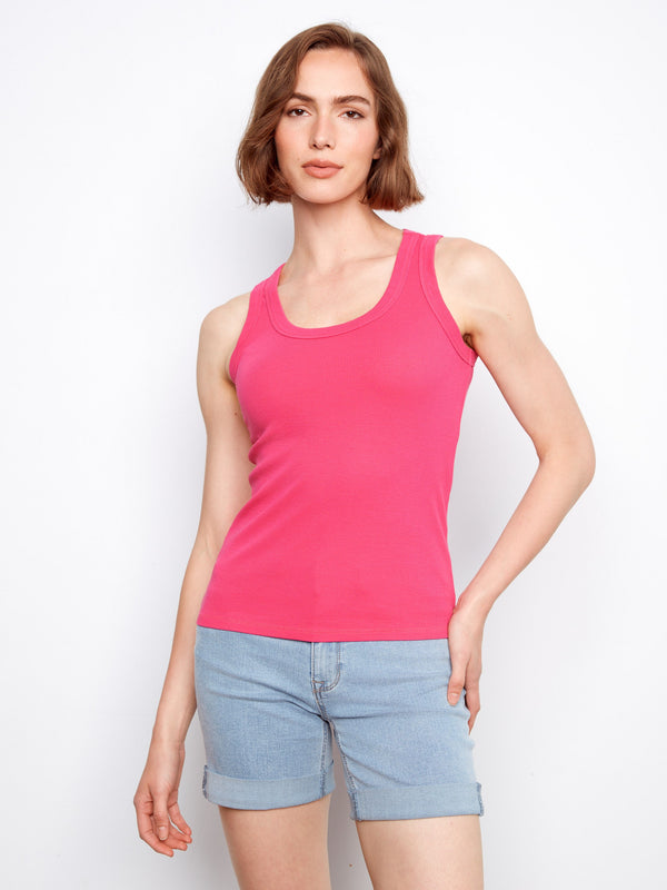 This vibrant pink tank top features a scoop neckline, ideal for casual outings. The design is both stylish and comfortable by Charlie B.