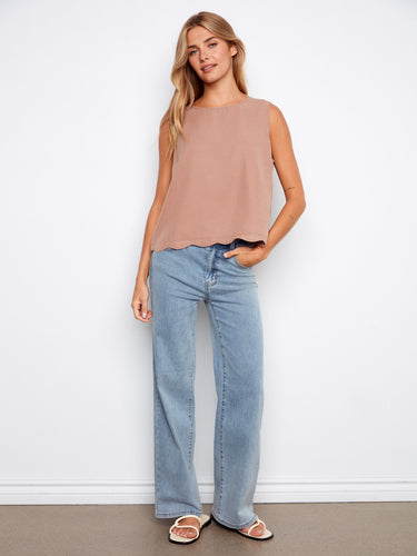Effortlessly stylish loose fit top featuring a crew neckline, ideal for pairing with denim or skirts by Charlie B.