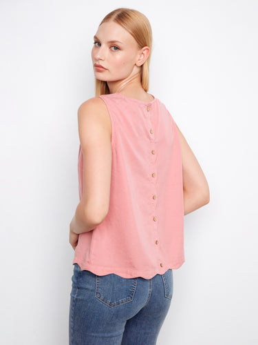 Stylish pink top with decorative back buttons for an added fashion-forward detail. By Charlie B.