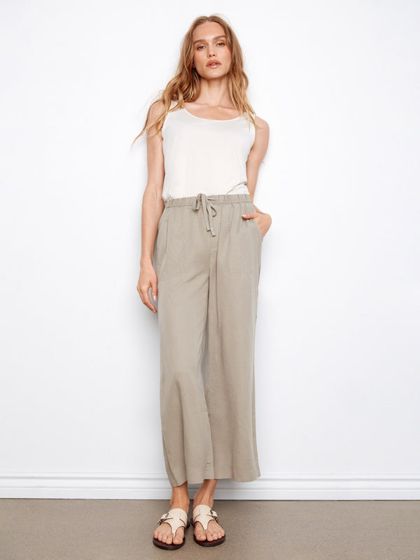 Wide leg pants with a relaxed fit and stylish design, perfect for a casual day out. By Charlie B.