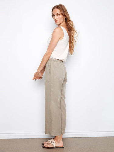 Regular rise design provides classic style with contemporary appeal in these fashionable pants. By Charlie B.