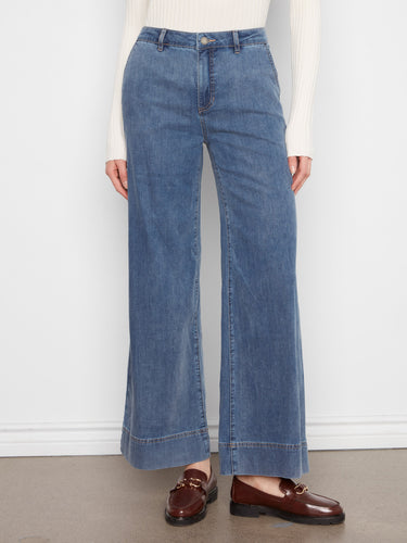 These full-length, medium blue wide-leg pants provide a versatile addition to any wardrobe by Charlie B.