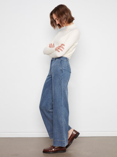 Featuring regular rise design, these medium blue wide-leg pants offer comfort and style by Charlie B.